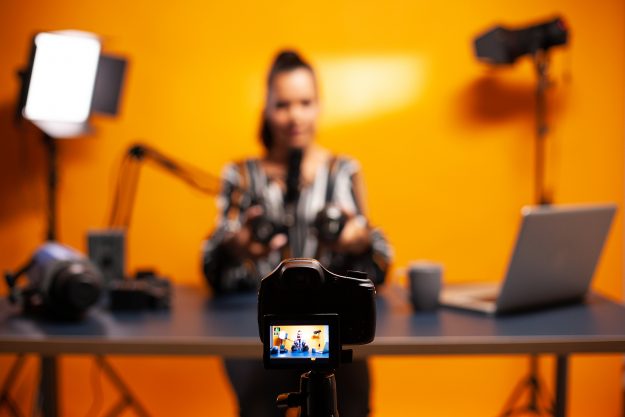 Professional Camera Recording Vlog Of Famous Blogger. New Media