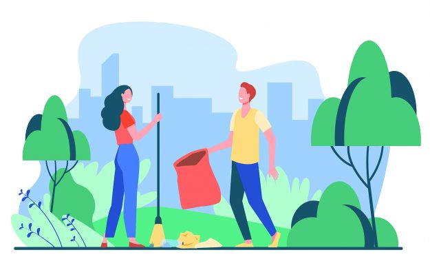 Happy Couple Picking Up Litter Outdoors. Young People Cleaning P