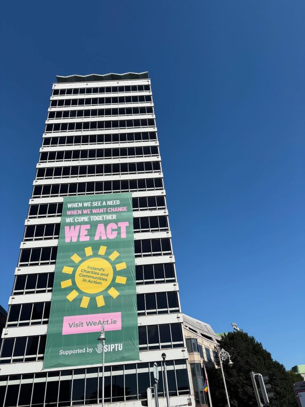 1. We Act campaign banner recently unfurled on Liberty Hall, Dublin shining a spotlight on work of charities & community groups and marking International Day of Charity, Fri Sept 5